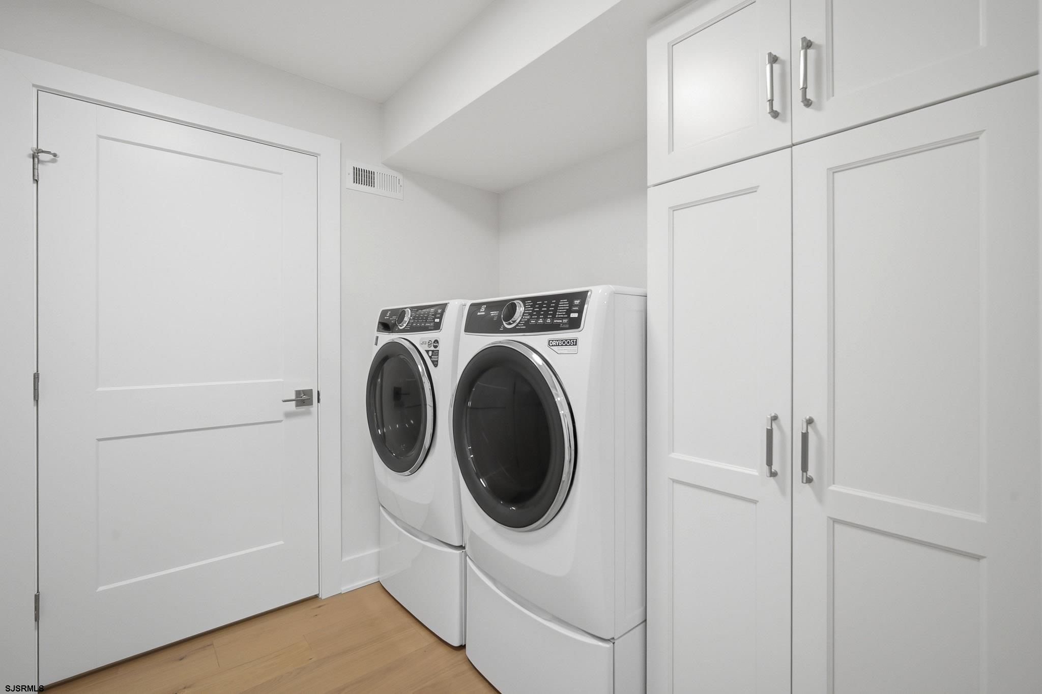 230 7th Street South Brigantine, NJ 08203 - Photo 14 of 87 a utility room with dryer and washer