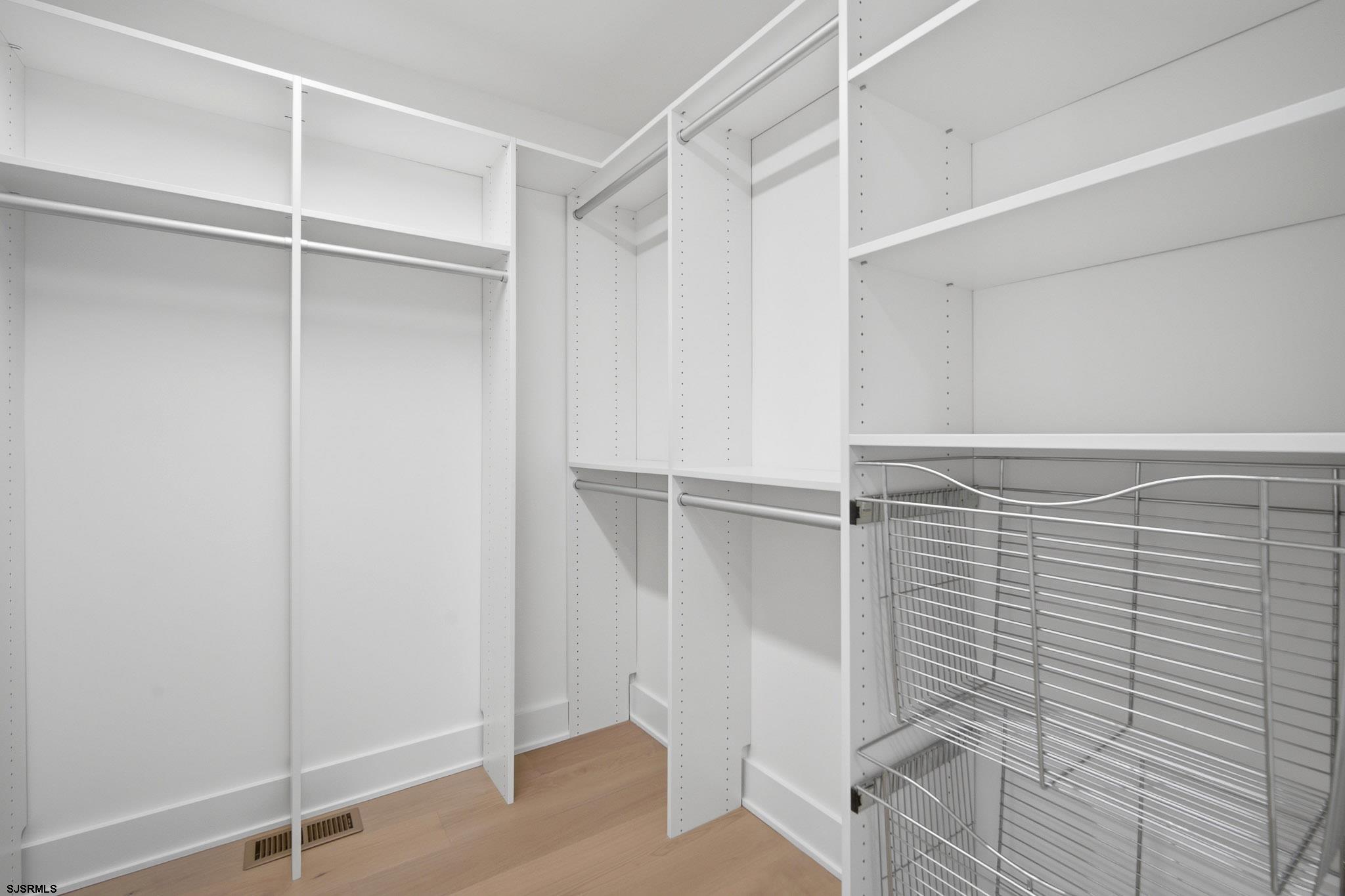 230 7th Street South Brigantine, NJ 08203 - Photo 39 of 87 a view of walk in closet with empty racks