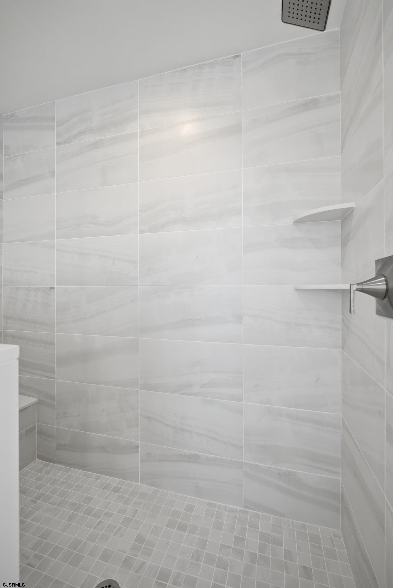 230 7th Street South Brigantine, NJ 08203 - Photo 50 of 87 a bathroom with a shower