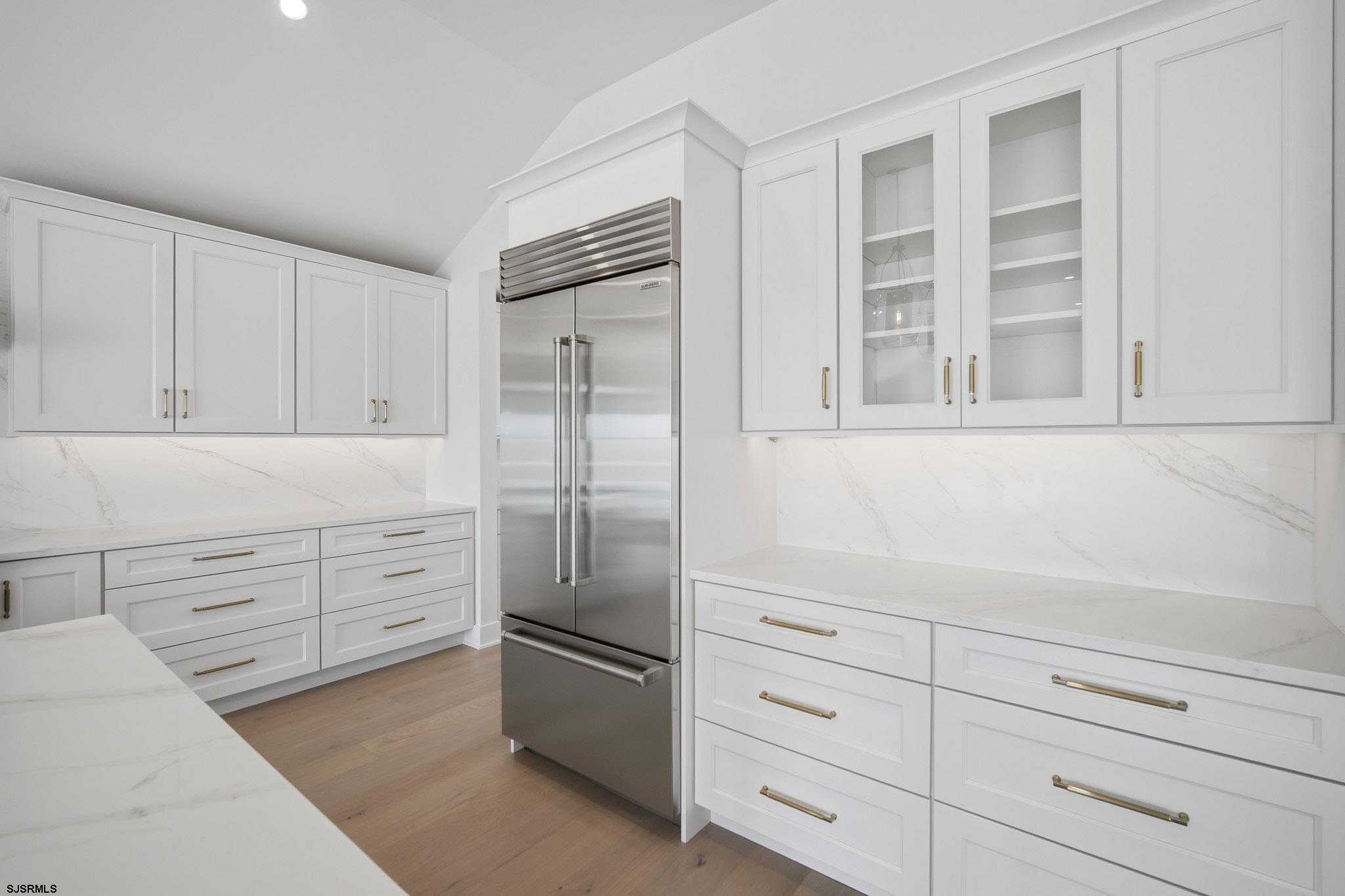 230 7th Street South Brigantine, NJ 08203 - Photo 74 of 87 a kitchen with cabinets stainless steel appliances and cabinets