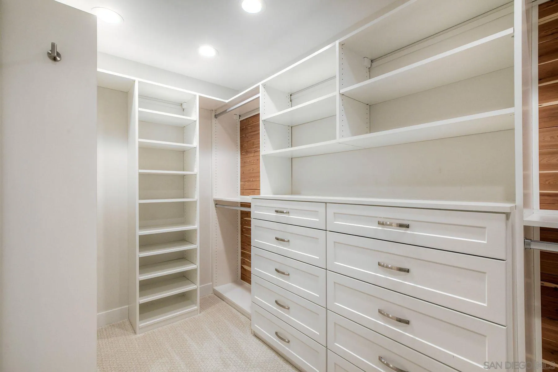 1711 Burgundy Road Encinitas, CA 92024 - Photo 24 of 45 a view of an empty walk in closet