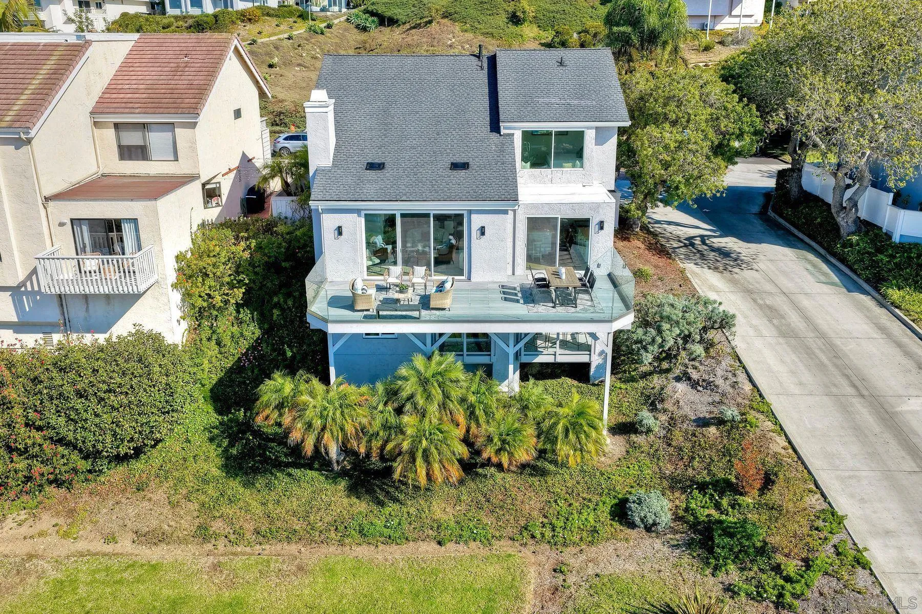 1711 Burgundy Road Encinitas, CA 92024 - Photo 34 of 45 a aerial view of a house with a yard