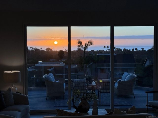 a view of balcony with furniture