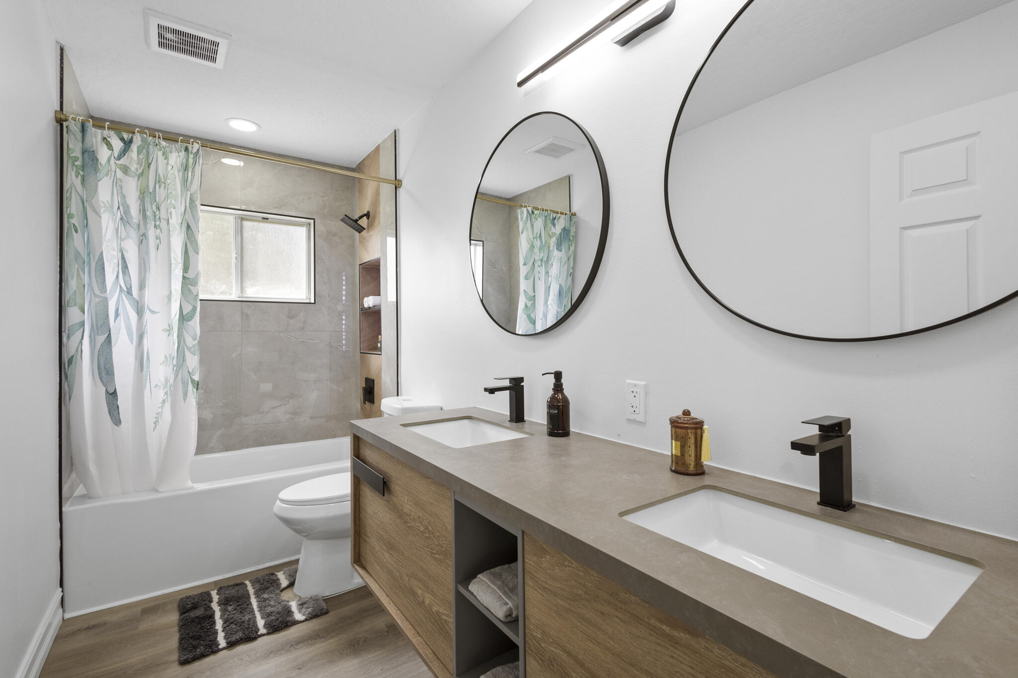 1695 Rustic Way Melbourne, FL 32935 - Photo 14 of 24 a bathroom with a sink and a mirror