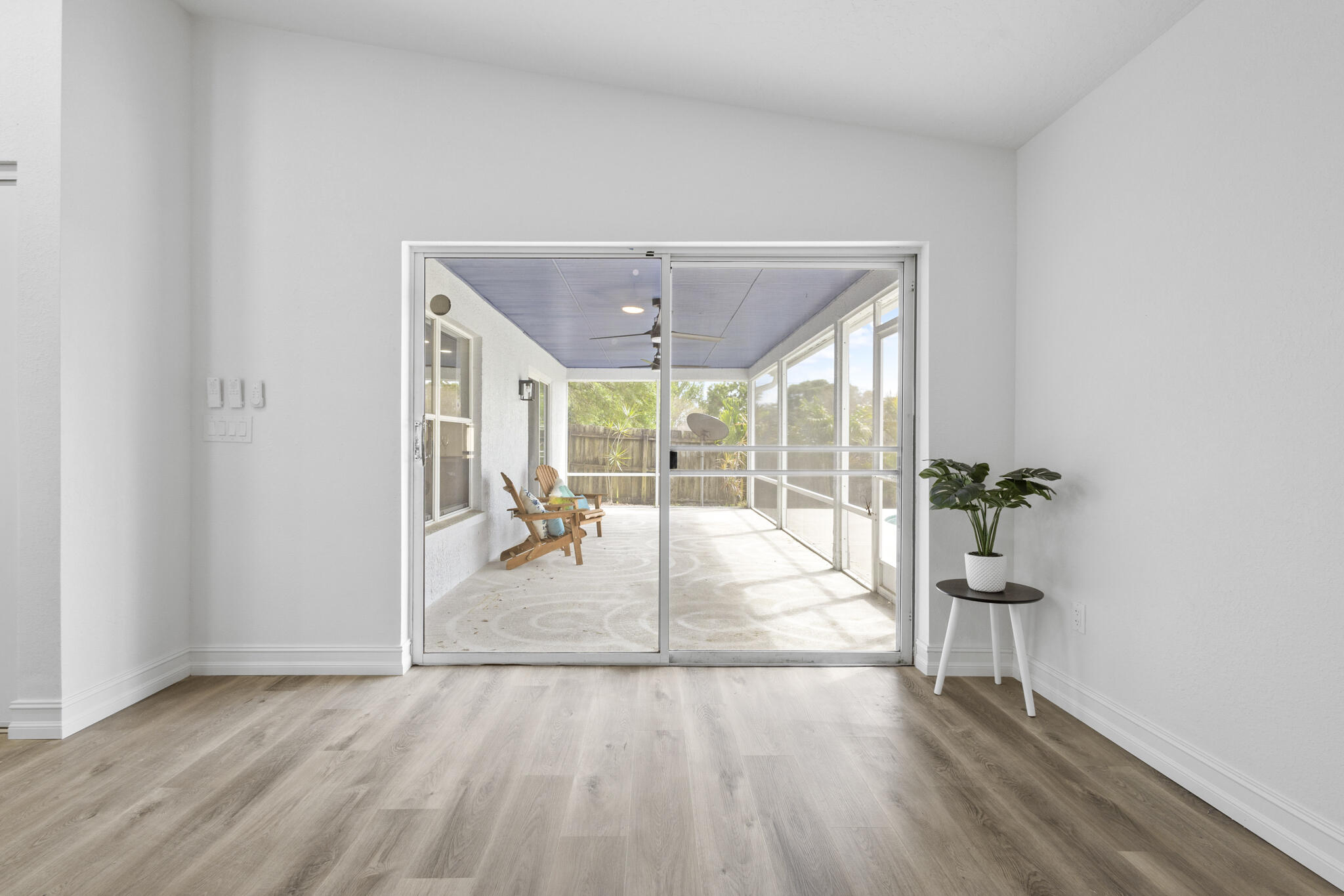 1695 Rustic Way Melbourne, FL 32935 - Photo 19 of 24 a living room with furniture and a large window