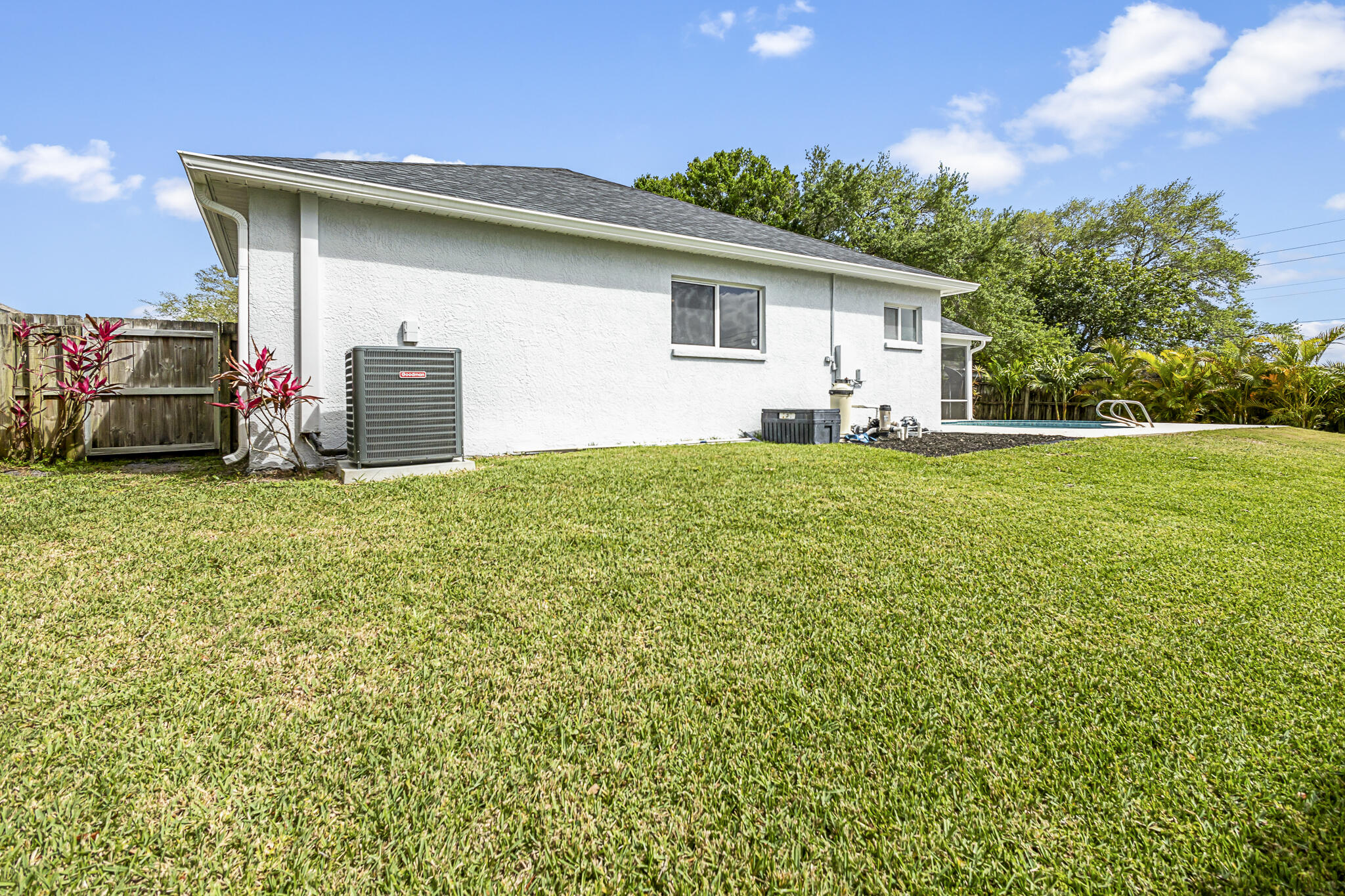 1695 Rustic Way Melbourne, FL 32935 - Photo 22 of 24 a view of a house with backyard and trees