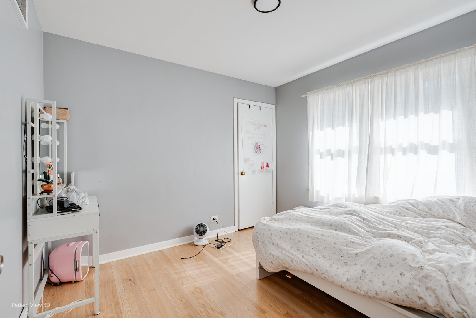 8152 North Ozark Avenue Niles, IL 60714 - Photo 11 of 28 a bedroom with a bed and a window