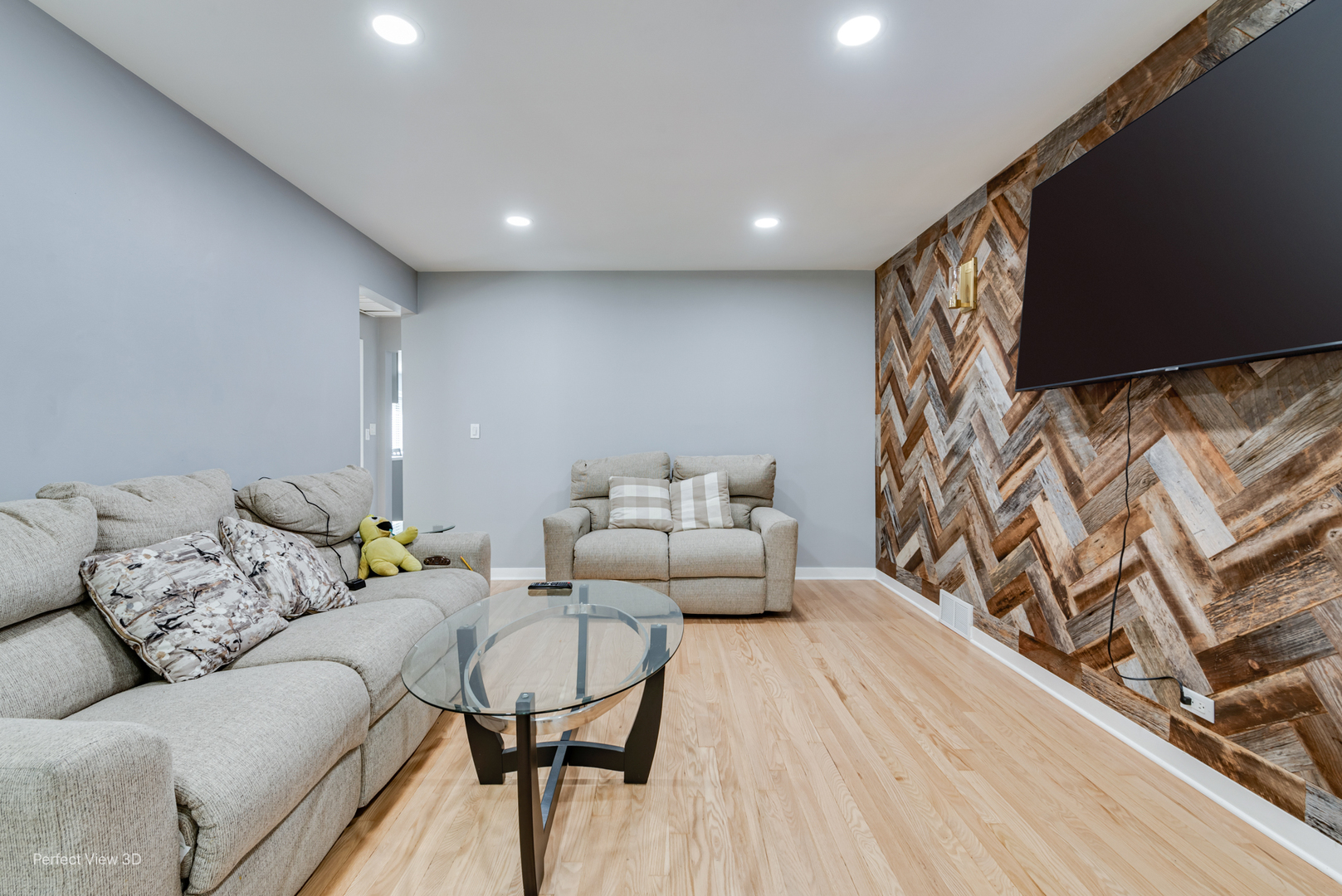 8152 North Ozark Avenue Niles, IL 60714 - Photo 3 of 28 a living room with furniture and a flat screen tv