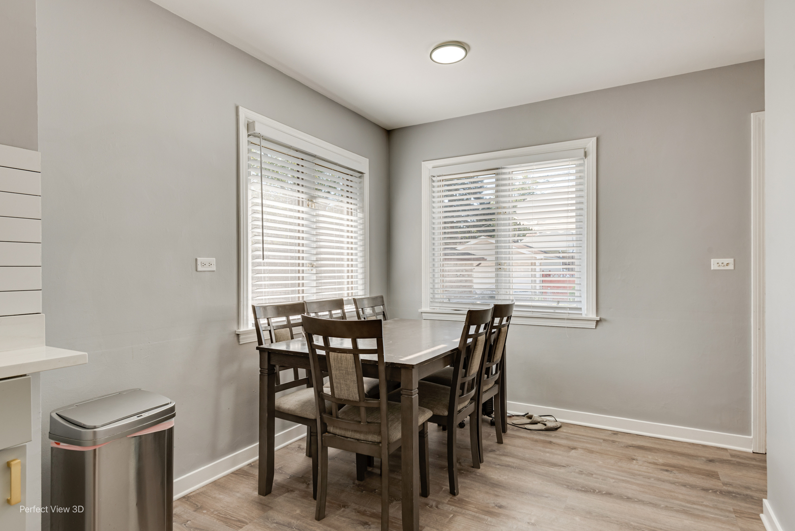 8152 North Ozark Avenue Niles, IL 60714 - Photo 10 of 28 a view of a dining room with furniture and window