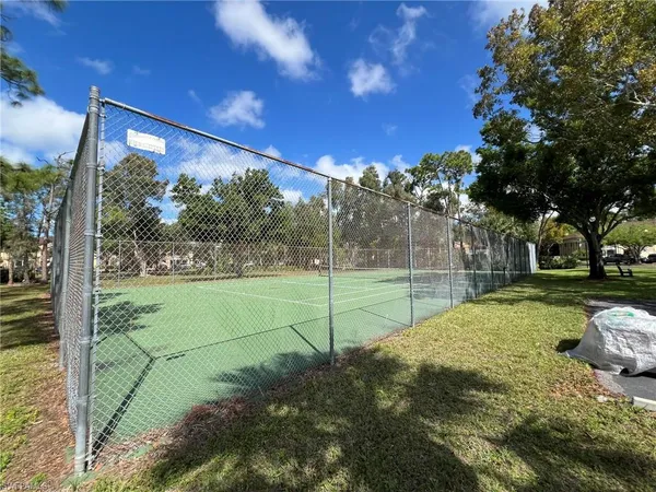 a view of a field with entertaining space