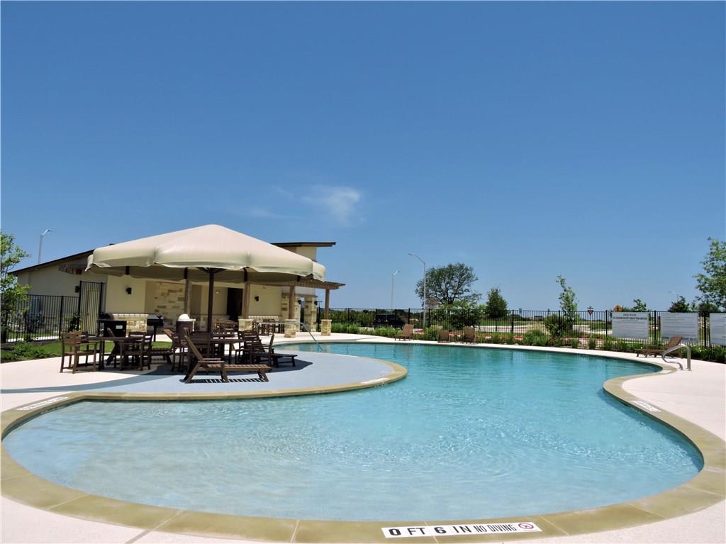 1005 Sundrops Street Leander, TX 78641 - Photo 33 of 39 a view of a swimming pool and outdoor space