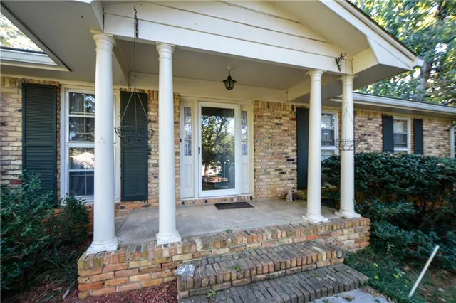 a view of a entryway door front of house