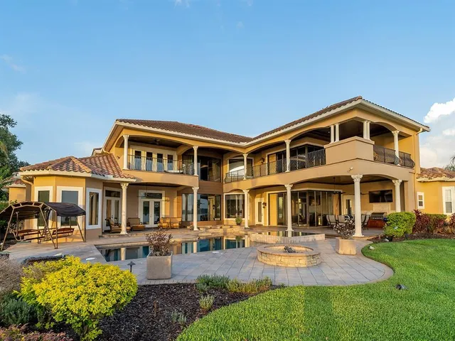 a view of a living room and kitchen with a large window