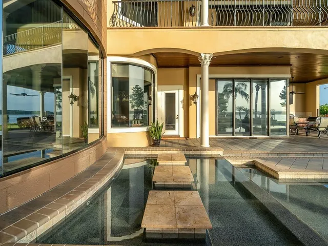 a view of a golf course with a lake