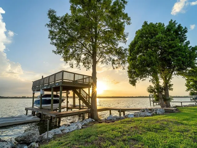 a view of a lake with a sitting area