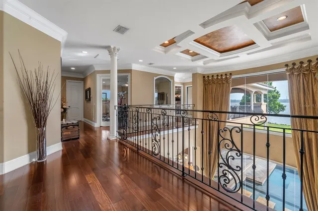 a bedroom with a bed and a view of en suite bathroom