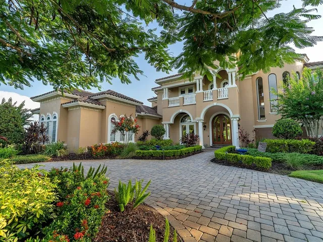 a kitchen with a refrigerator and a stove