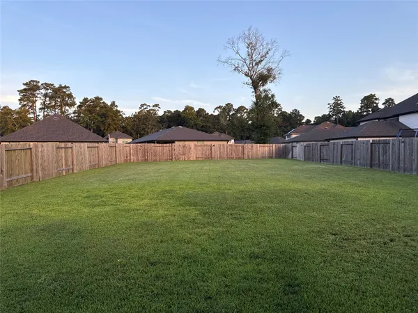 a view of a backyard with a garden