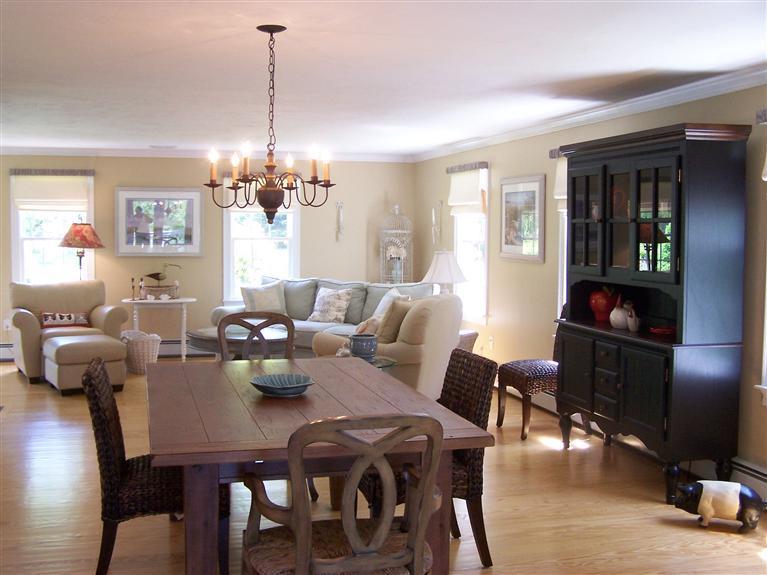 238 Tonset Road Orleans, MA 02653 - Photo 15 of 34 a view of a dining room with furniture window and wooden floor