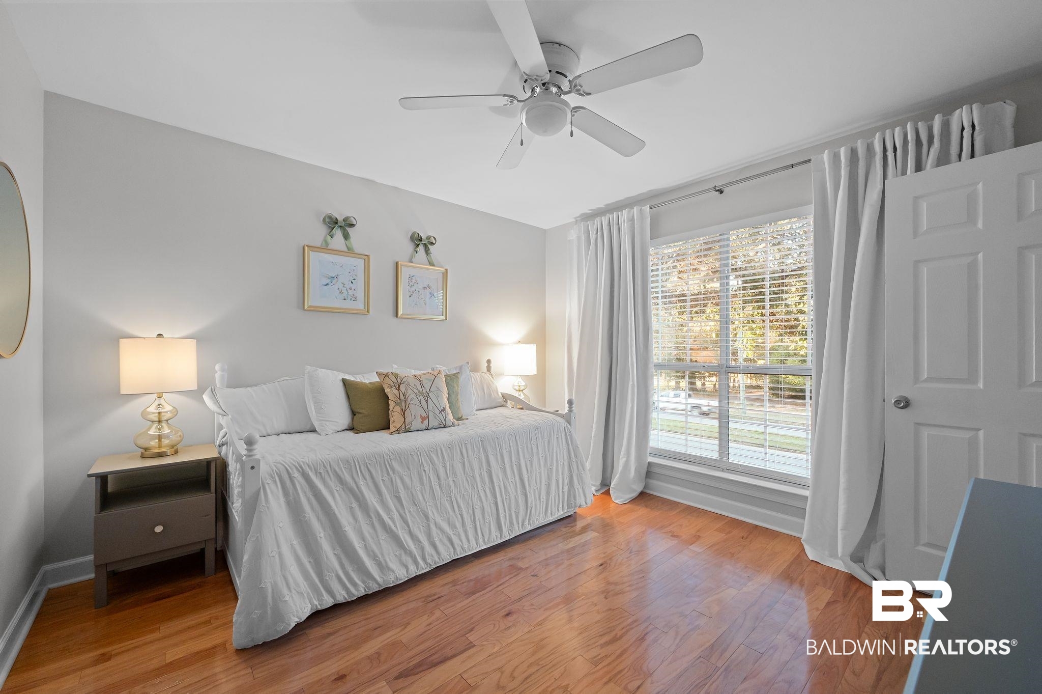 1825 Spring Hill Avenue Mobile, AL 36607 - Photo 22 of 43 Bedroom featuring light wood finished floors and ceiling fan