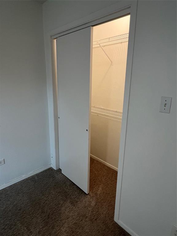 3929 Inwood Road, Unit 2021 Dallas, TX 75209 - Photo 17 of 24 Built-in closet with sliding doors and wire shelving system