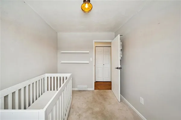 a view of a room with a window