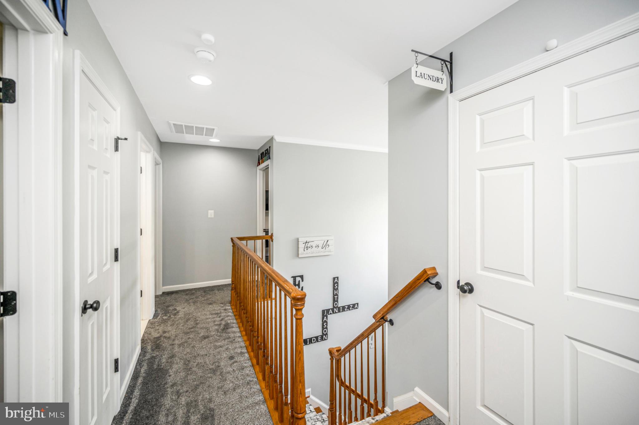 239 Toluca Road Stafford, VA 22556 - Photo 53 of 75 Bright and inviting upstairs hallway.
