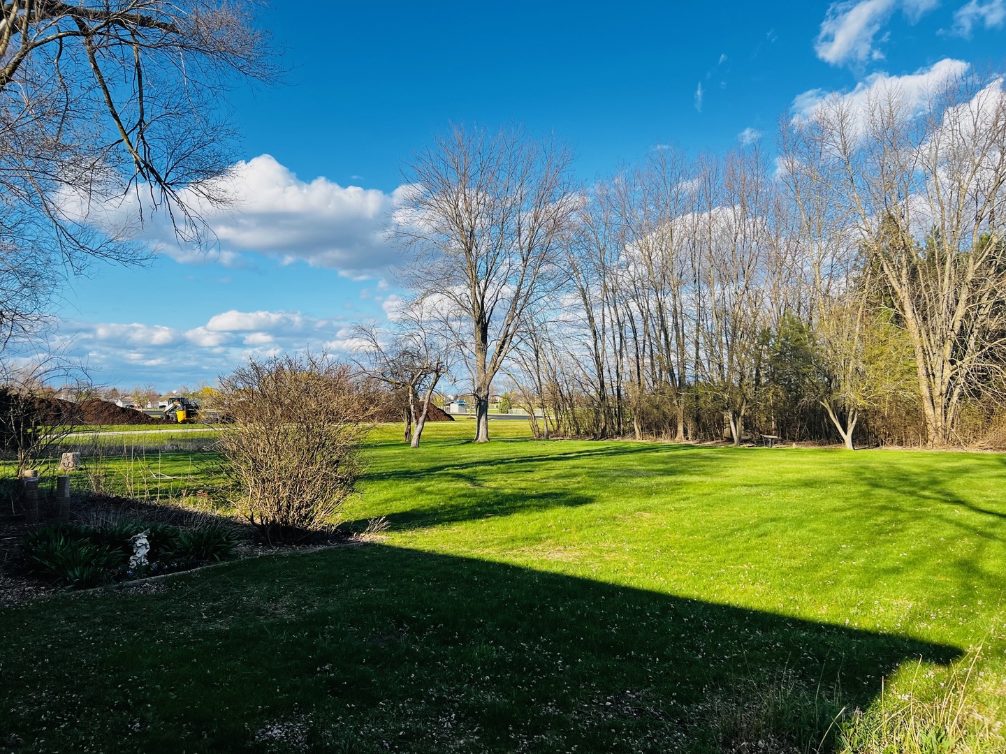 9204 Haligus Road Huntley, IL 60142 - Photo 5 of 9 a view of a golf course with a garden