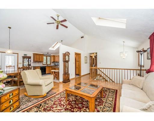 17 Jennings Road Billerica, MA 01862 - Photo 5 of 29 a living room with furniture and a chandelier