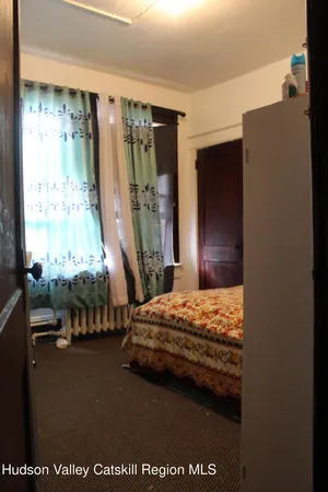 a utility room with cabinets washer and dryer