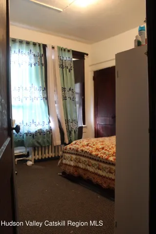 a utility room with cabinets washer and dryer
