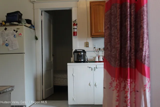 a bathroom with a toilet a sink and bathtub