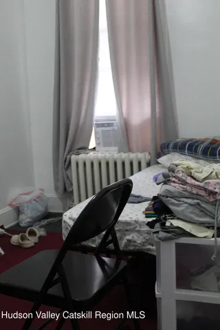 a view of a dining table and chairs