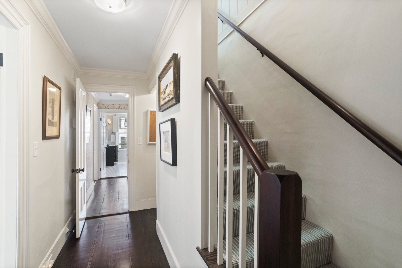 19 Orange Street Nantucket, MA 02554 - Photo 51 of 85 a view of a hallway with wooden floor and staircase