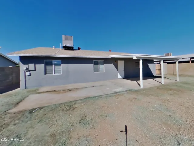 a bathroom with a sink a light fixture and a mirror
