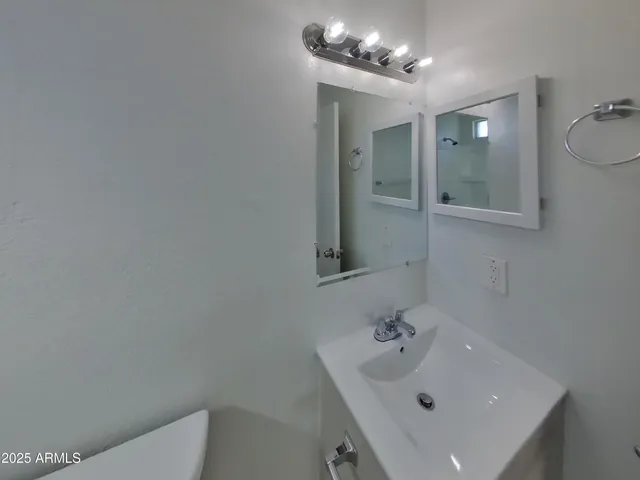an empty room with a bathroom