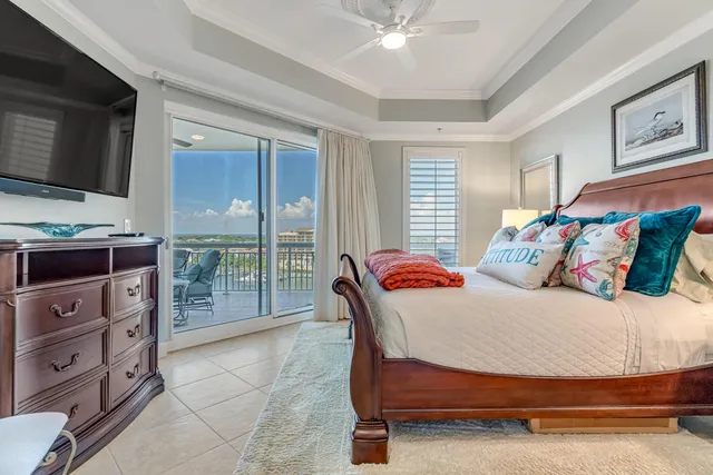 a view of a chairs and table in the balcony