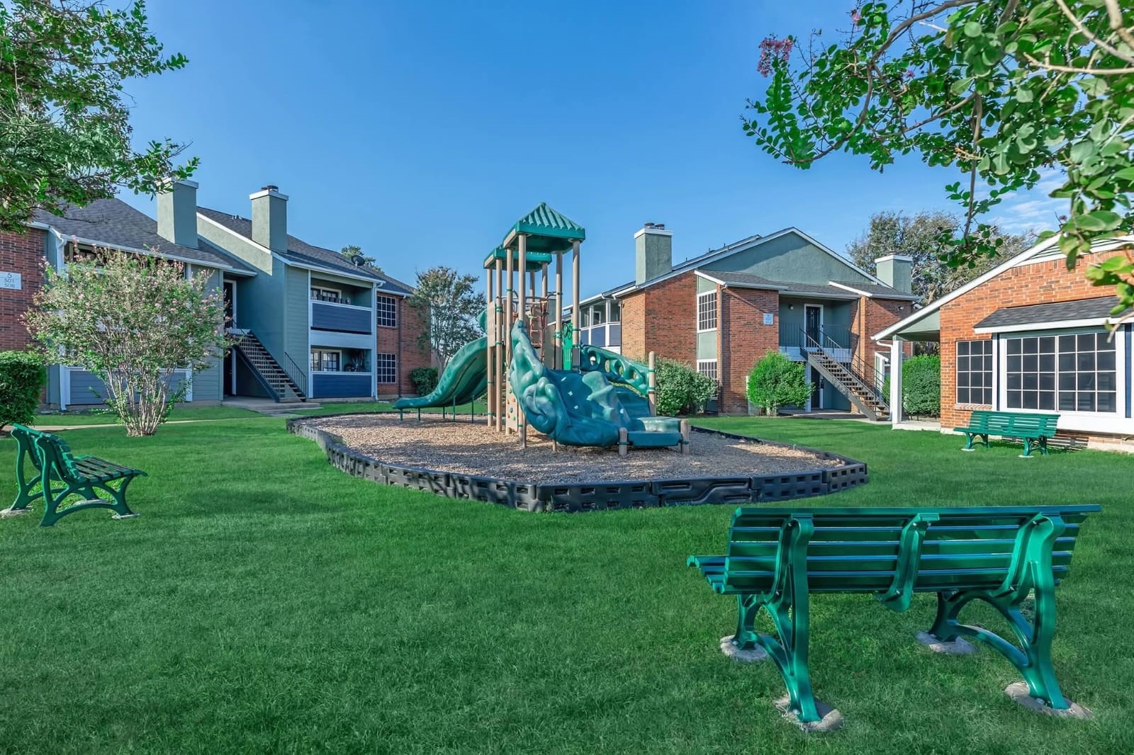 3737 Timberglen Road, Unit 909 Dallas, TX 75287 - Photo 15 of 19 a view of a house with a yard porch and sitting area