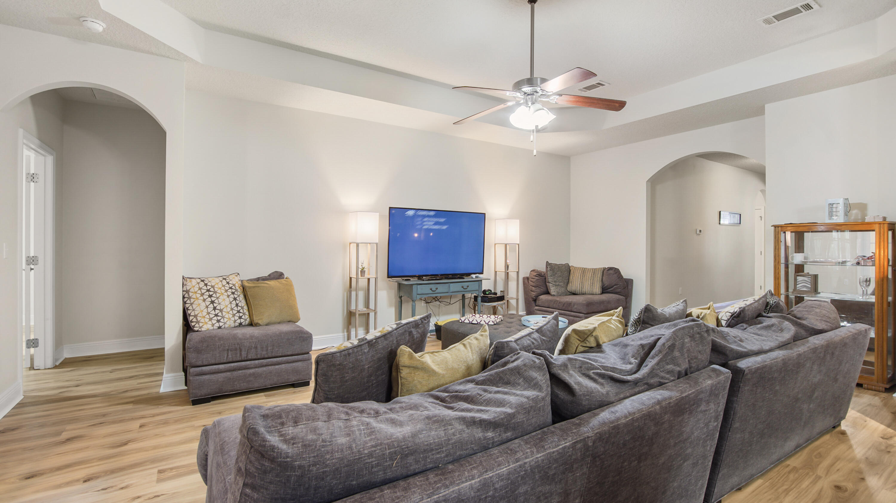 446 Mango Lane Freeport, FL 32439 - Photo 18 of 73 a living room with furniture and a chandelier