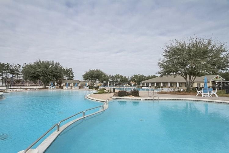 446 Mango Lane Freeport, FL 32439 - Photo 63 of 74 a view of a house with outdoor space and lake view