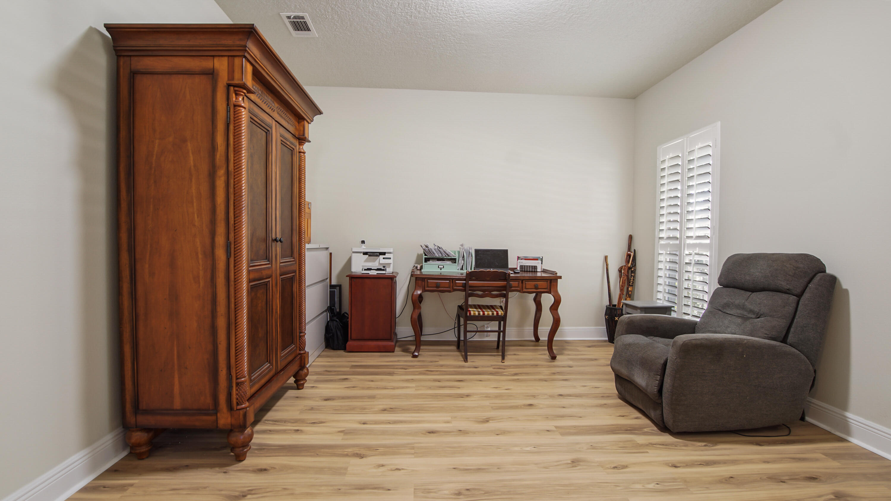 446 Mango Lane Freeport, FL 32439 - Photo 7 of 73 a living room with furniture and a wooden floor