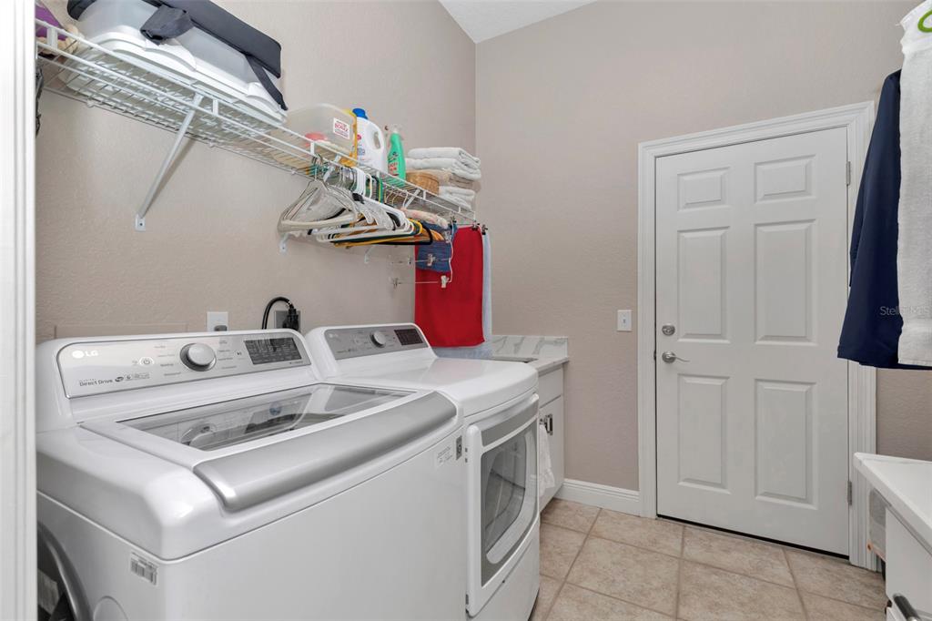 1989 Northwest 111th Loop Ocala, FL 34475 - Photo 35 of 55 a utility room with dryer and washer