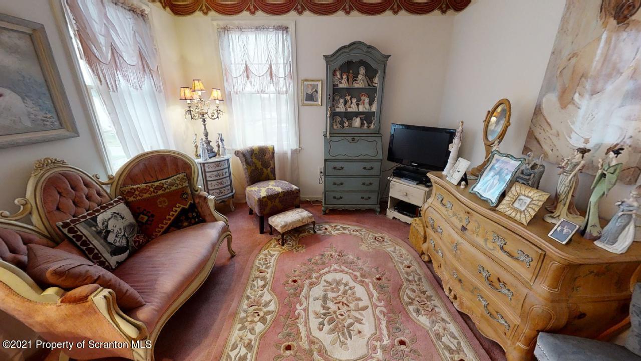 1355 Oak Drive Shavertown, PA 18708 - Photo 24 of 32 a living room with furniture a rug and a window