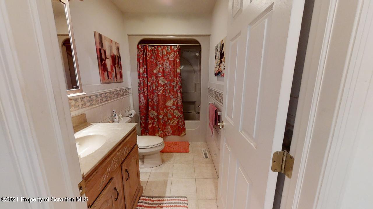 1355 Oak Drive Shavertown, PA 18708 - Photo 25 of 32 a bathroom with a sink toilet and shower