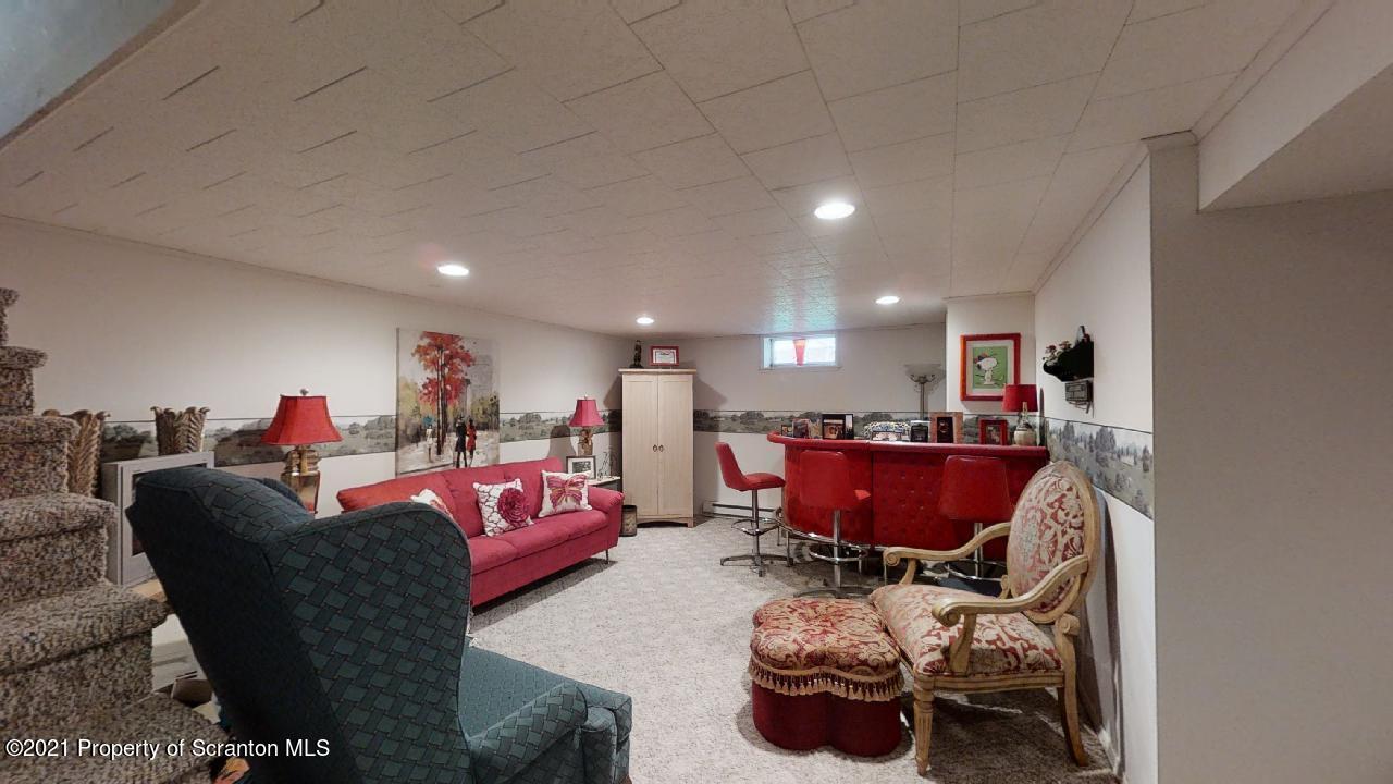 1355 Oak Drive Shavertown, PA 18708 - Photo 27 of 32 a living room with furniture and a gym equipment
