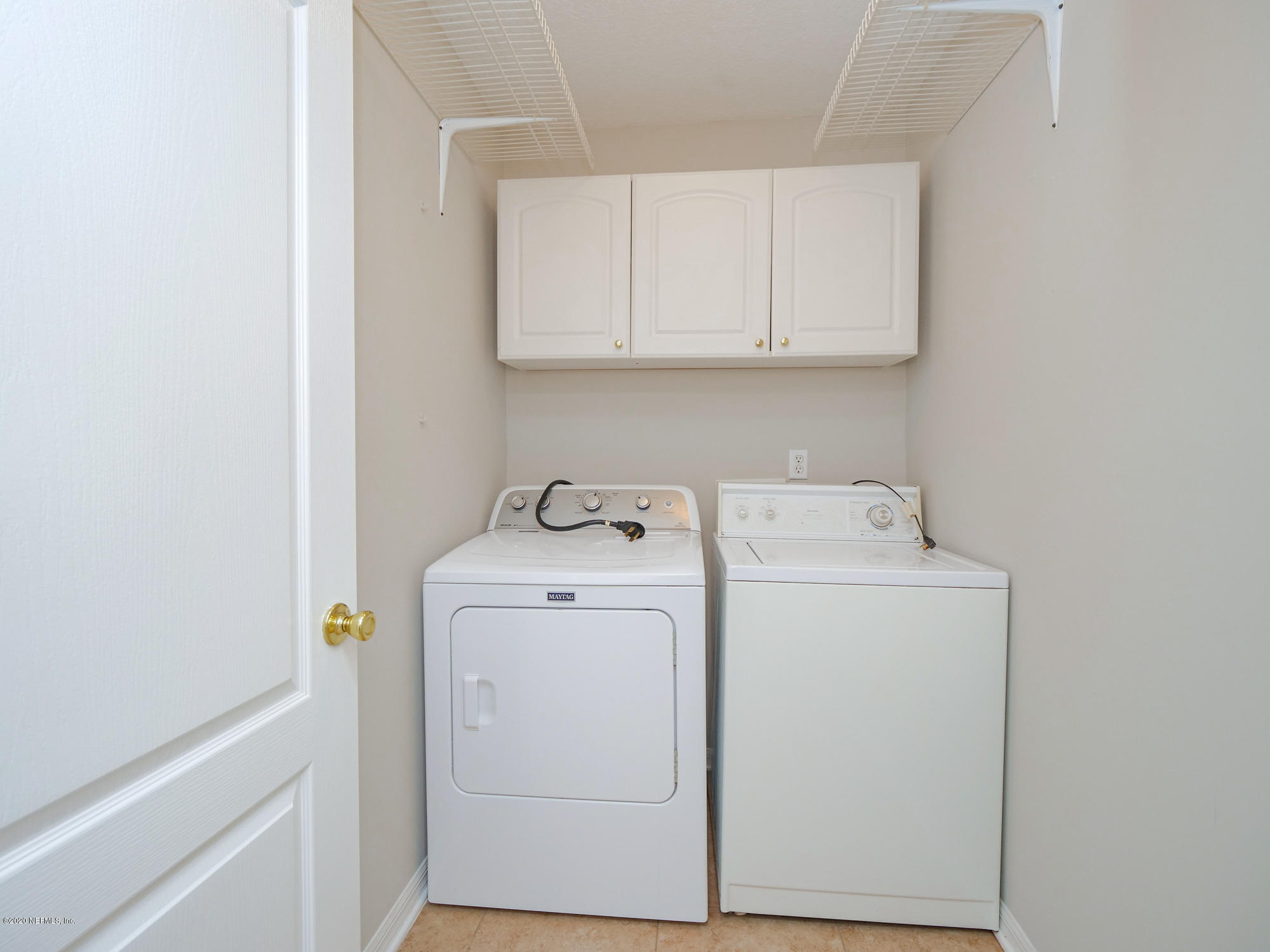 8663 Reedy Branch Drive Jacksonville, FL 32256 - Photo 26 of 33 a utility room with dryer and washer