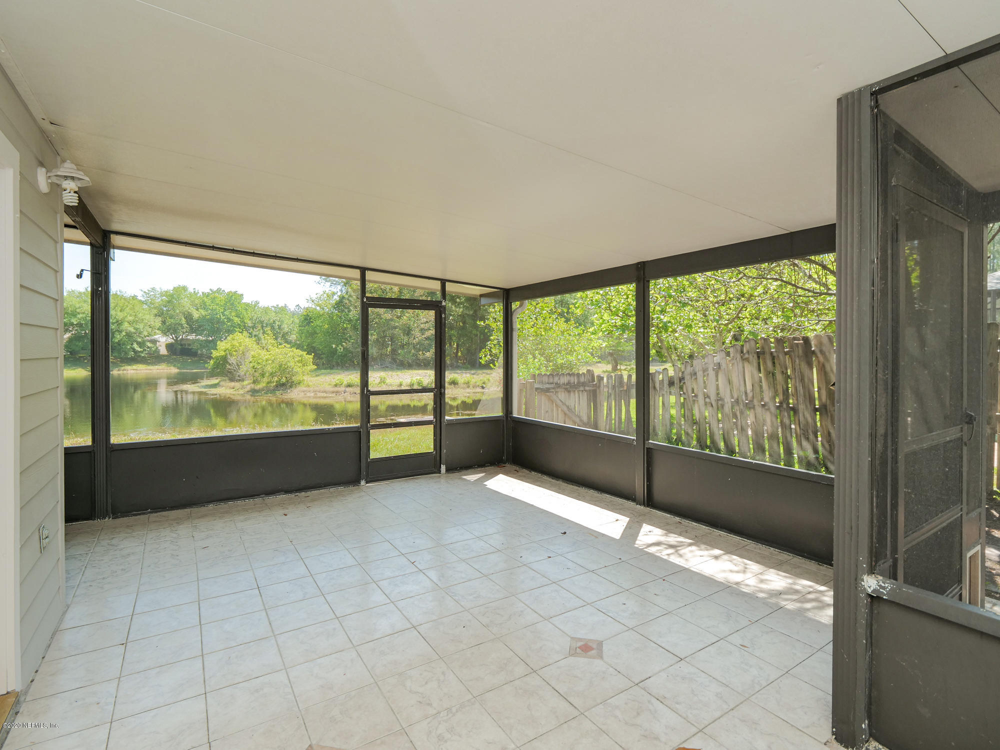 8663 Reedy Branch Drive Jacksonville, FL 32256 - Photo 27 of 33 a view of an empty room with a large window