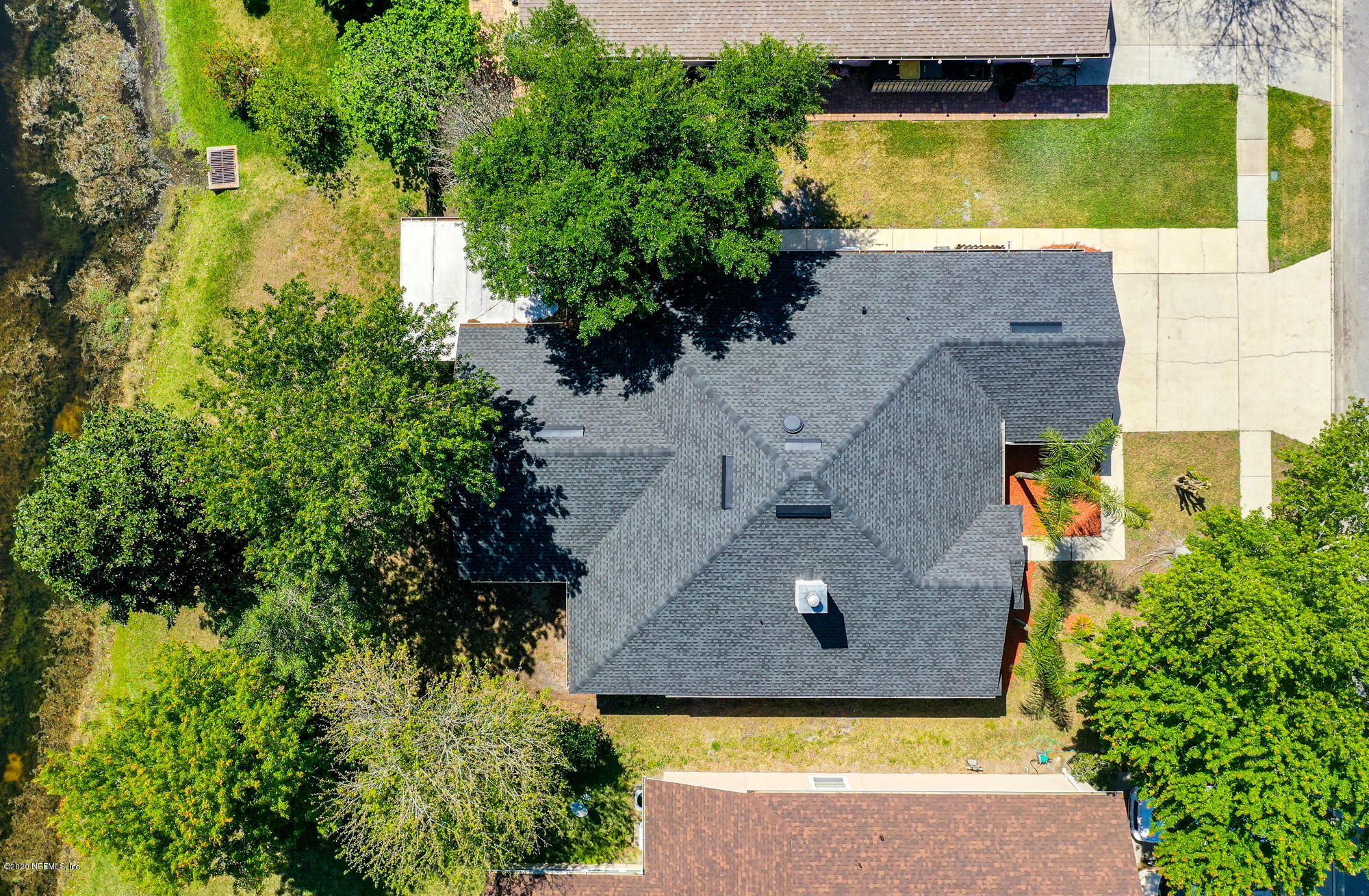 8663 Reedy Branch Drive Jacksonville, FL 32256 - Photo 28 of 33 an aerial view of a house with swimming pool