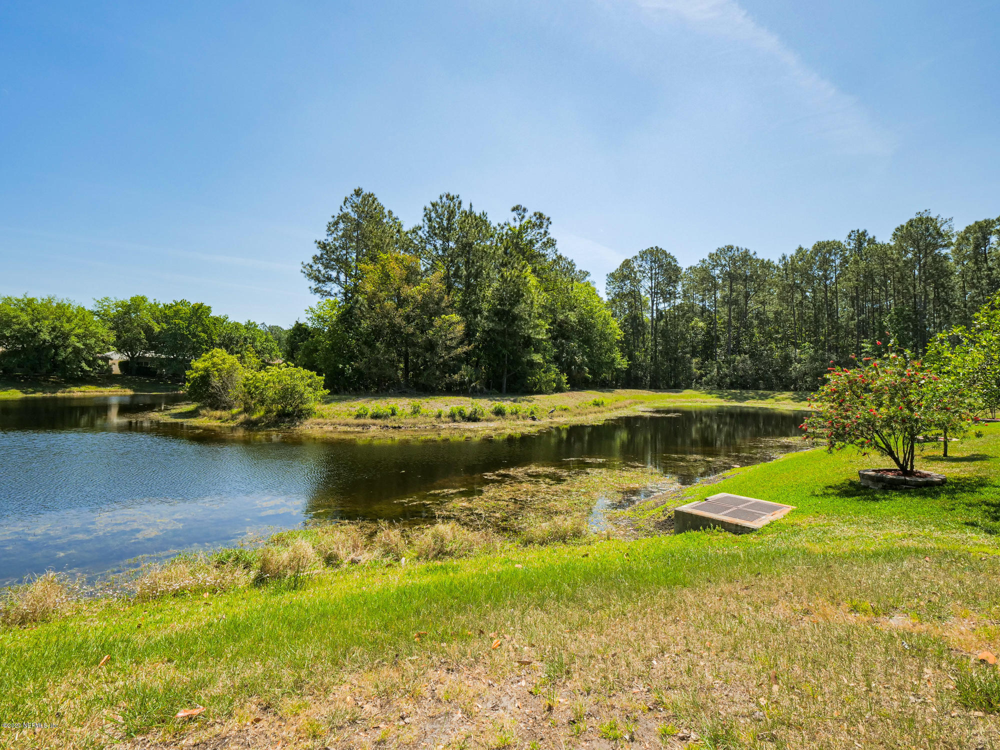 8663 Reedy Branch Drive Jacksonville, FL 32256 - Photo 30 of 33 a view of a lake with houses