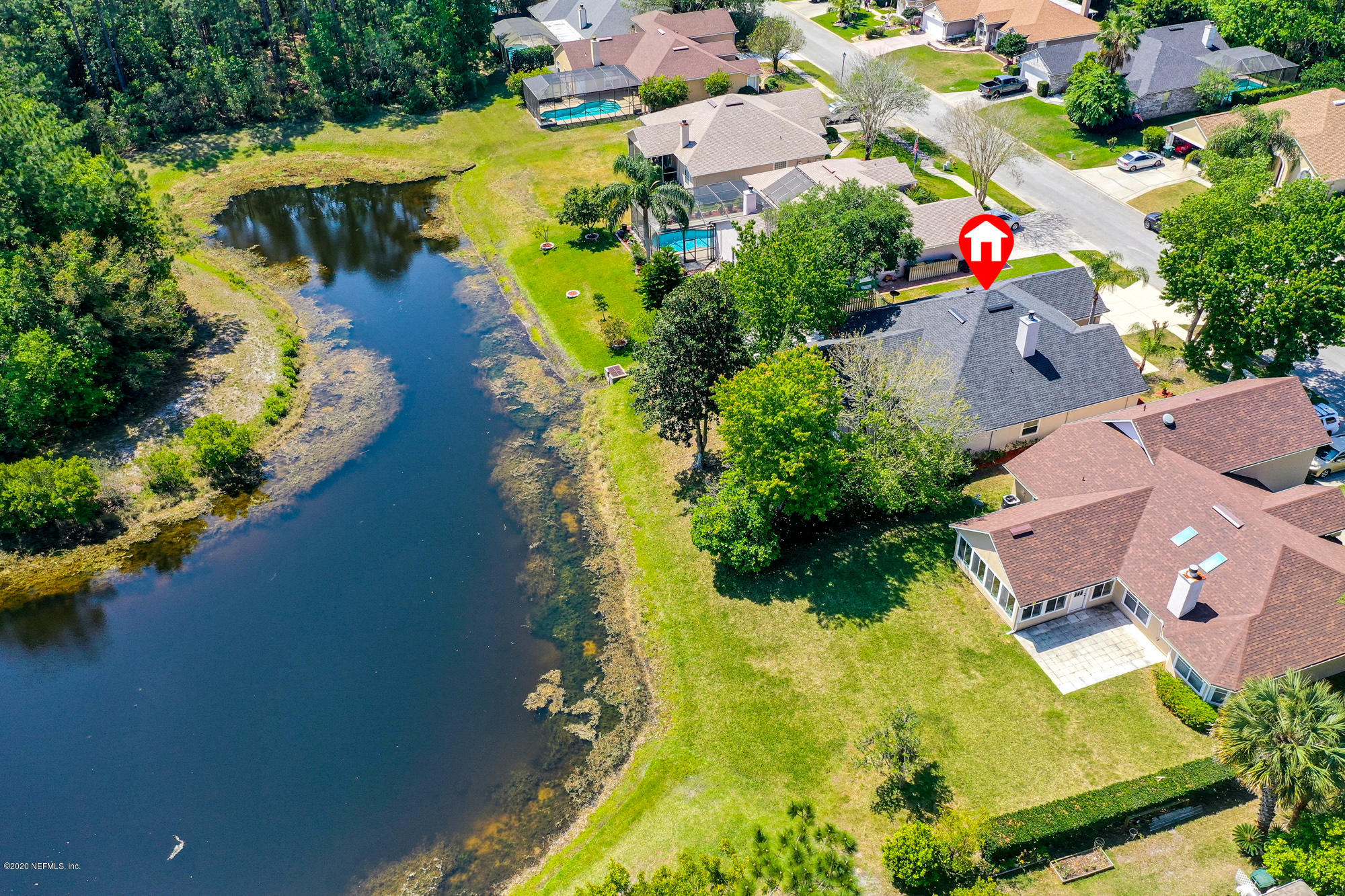 8663 Reedy Branch Drive Jacksonville, FL 32256 - Photo 32 of 33 an aerial view of residential house with swimming pool and garden space